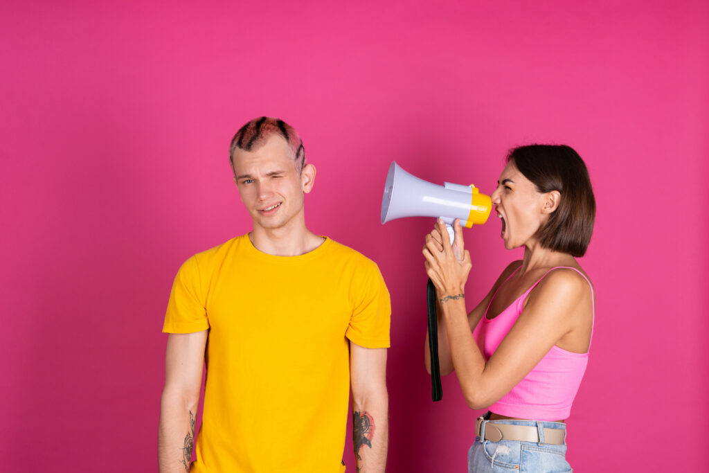 Two people learning how to measure brand awareness